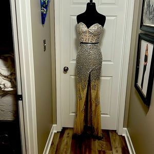 JOVANI 2 pc. Size 2 Crystal Beads strapless-bustier, long skirt with slit.